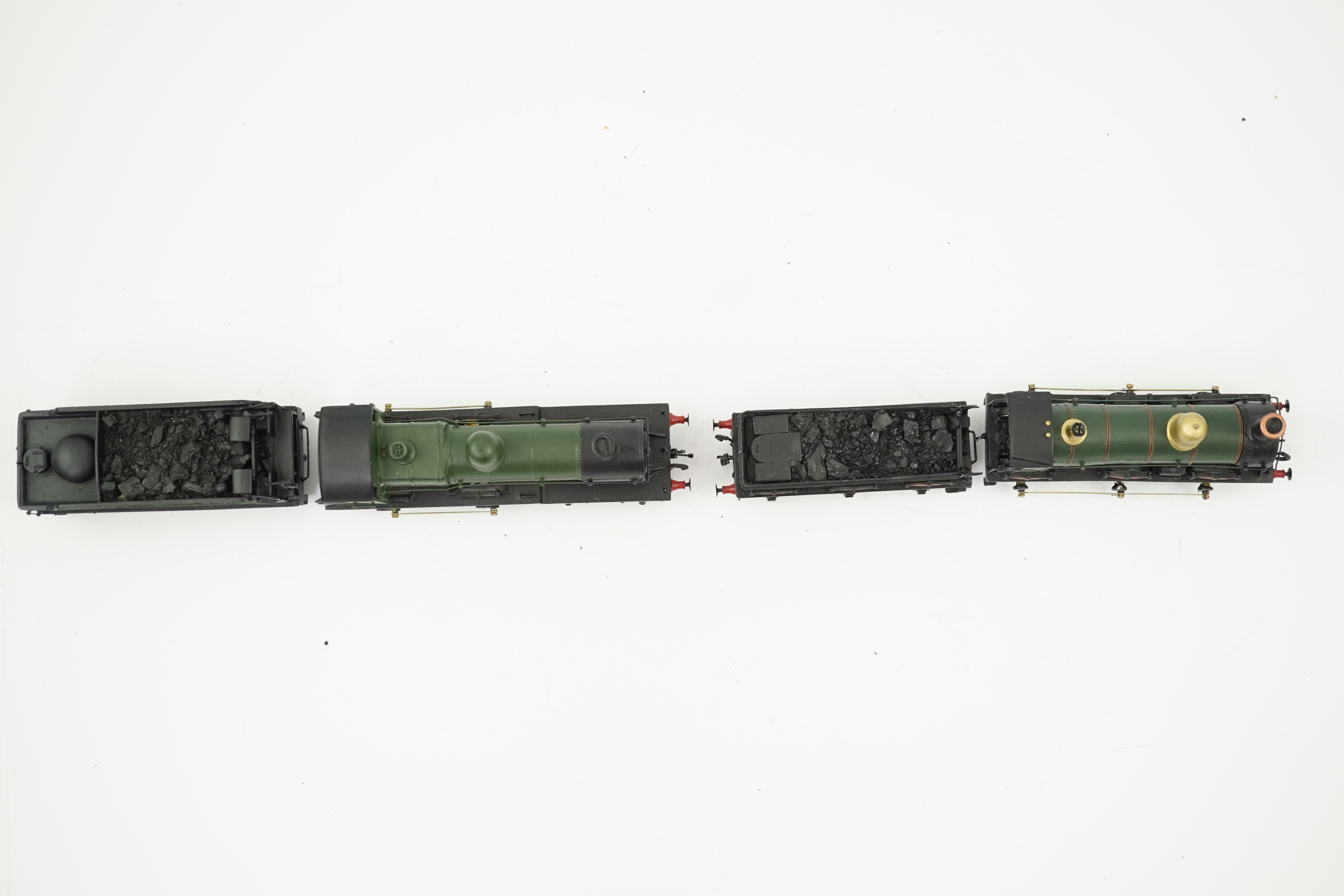 Two 00 gauge brass and white metal kit built GWR tender locomotives; an Armstrong 0-6-0, 671, together with an Earl class 4-4-0, Earl of Berkeley 3217, constructed, painted and lined to a high standard, both motored for